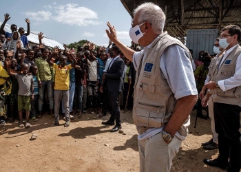 Africa: Josep Borrel, in the center, and Janez Lenarčič, on the right, greet the communities during a visit to the Qoloji Camp for Internally Displaced People, Ethiopia