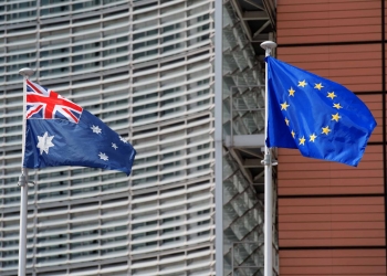 Australian and European flags in front of Berlaymont