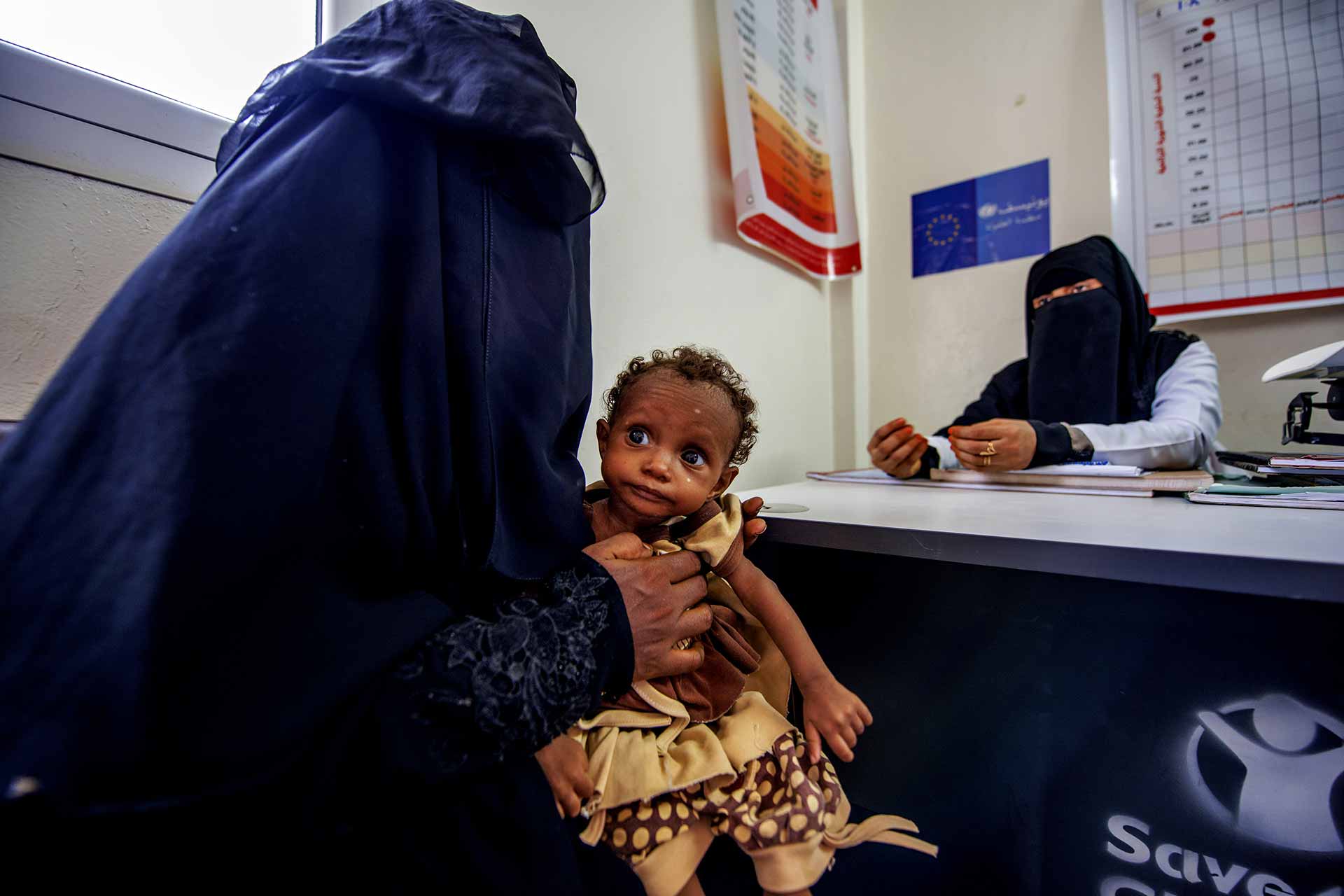 A mother with her severely malnourished daughter visits an EU-supported feeding centre in Yemen’s Lahij Governorate