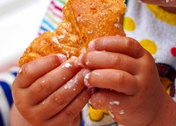 childrens hands eating