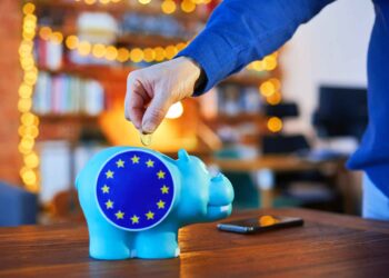 Savings, piggybank and EU flag