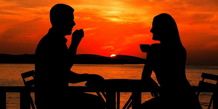 sunset-Summer holidays couple coffee