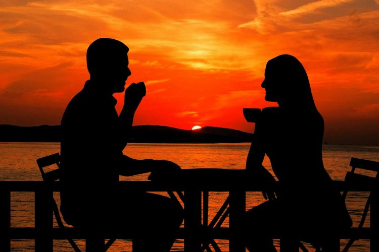 sunset-Summer holidays couple coffee