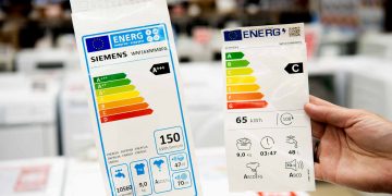 The old EU energy label, on the left, and the new energy label with a QR code