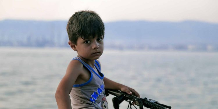 child in war in Syria