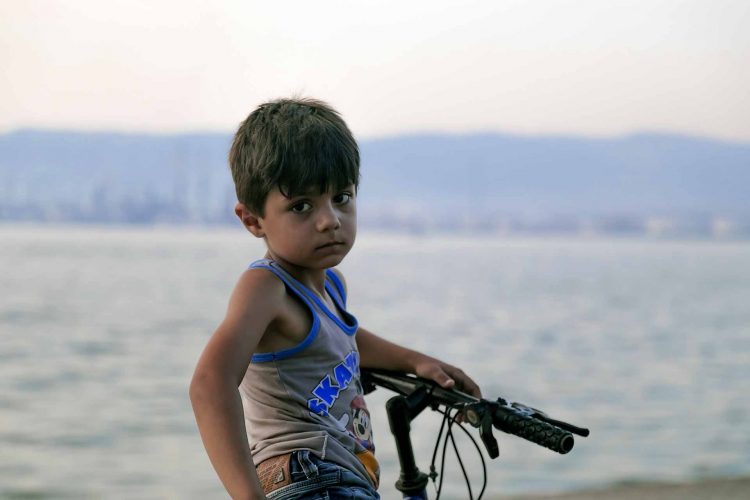 child in war in Syria